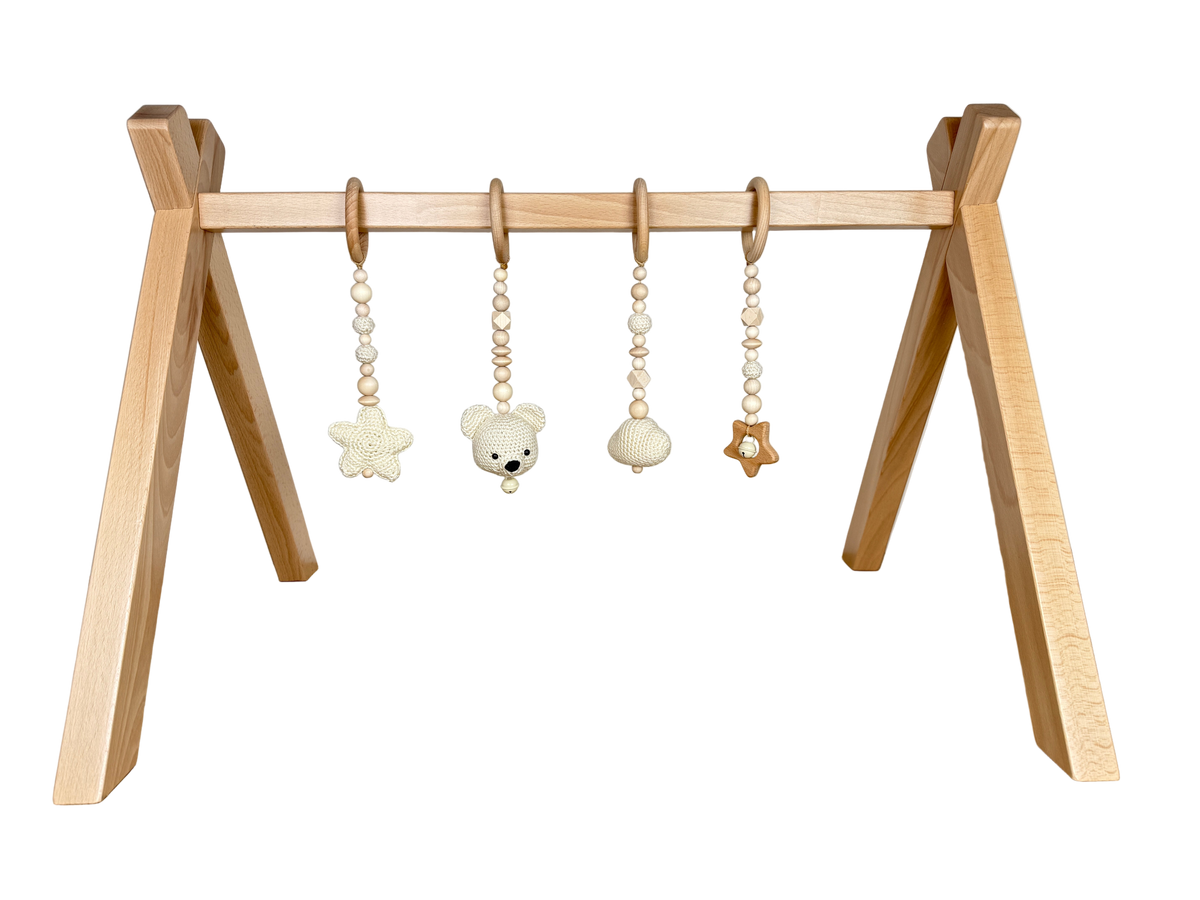 Spielbogen mit Anhängern TED Créme