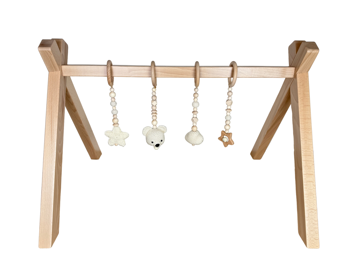 Spielbogen mit Anhängern TED Créme